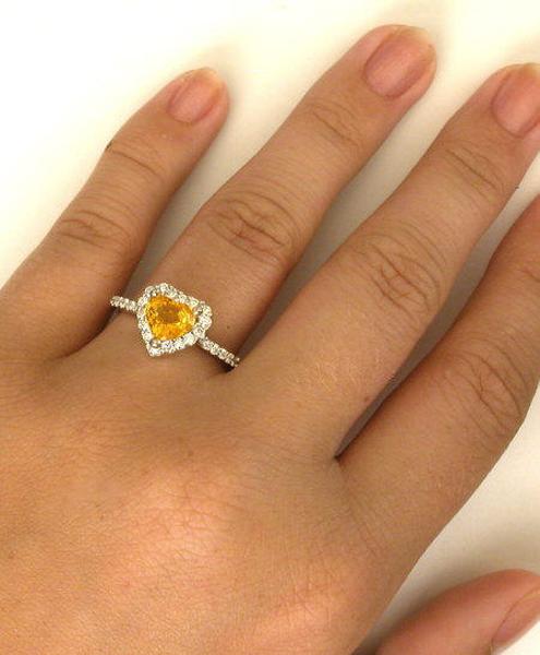 One of a Kind Heart Shape Natural Unheated Yellow-Orange Sapphire Engagement Ring in 18k on the finger