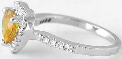 Side View of Single Row Diamond Band and Diamond Halo Setting with Heart Cut Natural Unheated Orange Sapphire