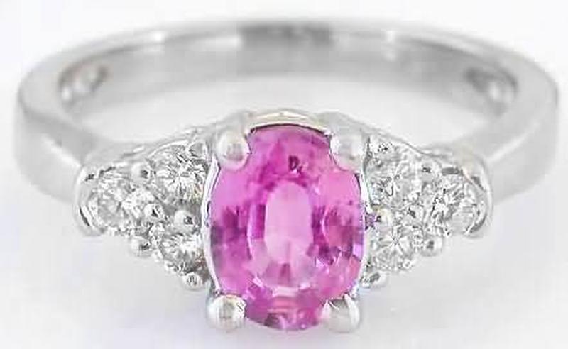 Oval cut natural blue sapphire engagement ring in 14k white gold