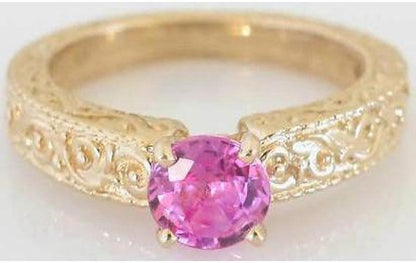 Solitaire set round cut natural pink sapphire engagement ring in 14k yellow gold