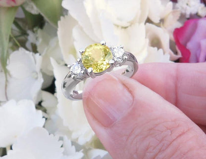 14k white gold Natural Yellow Sapphire Engagement Ring with a round center yellow sapphire and real round side diamonds 14k white gold bandNatural Yellow Sapphire Engagement Ring with a round center yellow sapphire and real round side diamonds