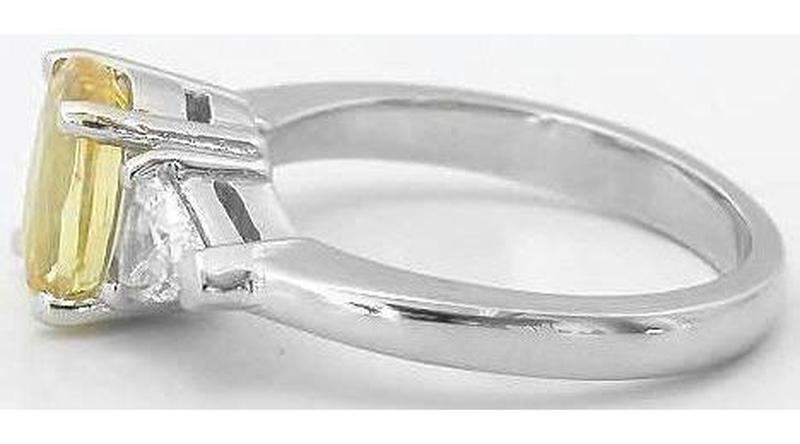 cushion yellow sapphire ring with trillion diamonds