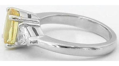 cushion yellow sapphire ring with trillion diamonds