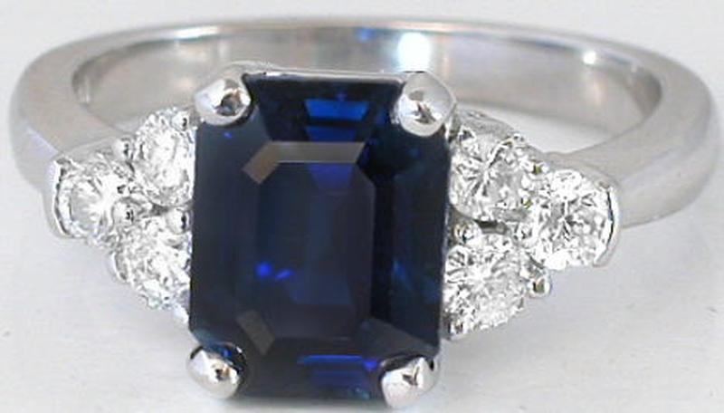 Emerald cut natural blue sapphire ring in 14k white gold