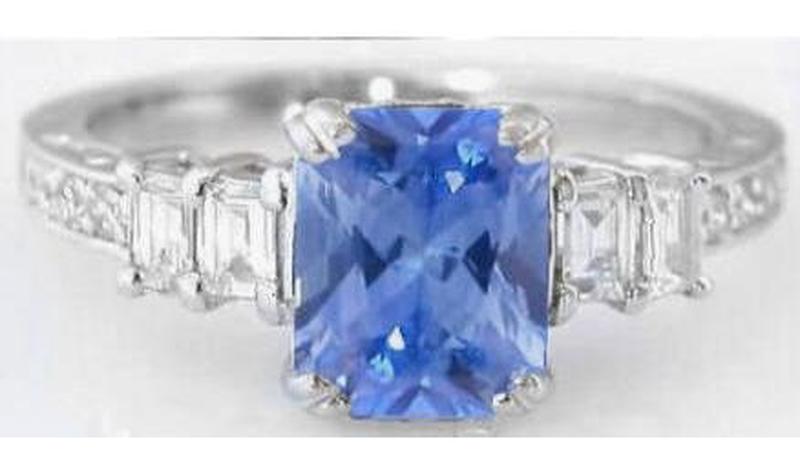 Sapphire Engagement Ring with Natural Ceylon Blue Sapphire in a Radiant Cut Paired with Fine Baguette Diamonds in 18k white gold