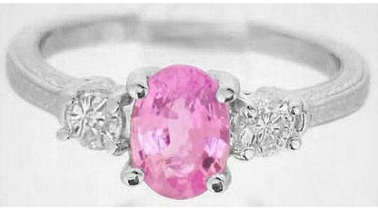 for sale: Natural Oval Pink Sapphire Engagement Ring with Round White Sapphire Sides in ornate 14k white gold band