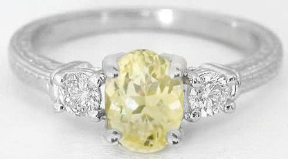 Natural Oval Light Yellow Sapphire Ring with Round White Sapphires in 14k white gold for sale