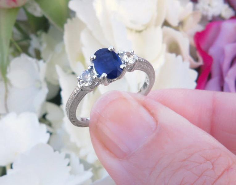 Natural Oval Blue Sapphire and Round White Sapphire Ring in 14k white gold