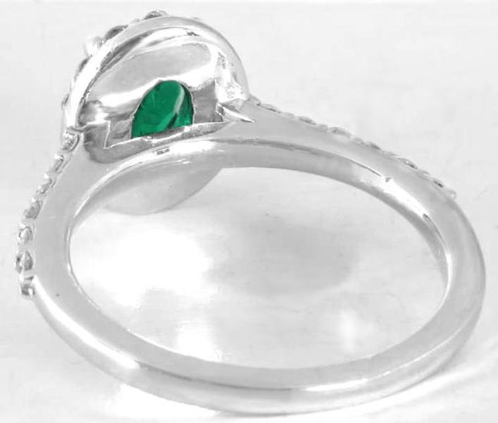Natural Colombian Emerald Ring with Brilliant Diamond Halo Setting and Diamonds Accenting the band in 14k white gold
