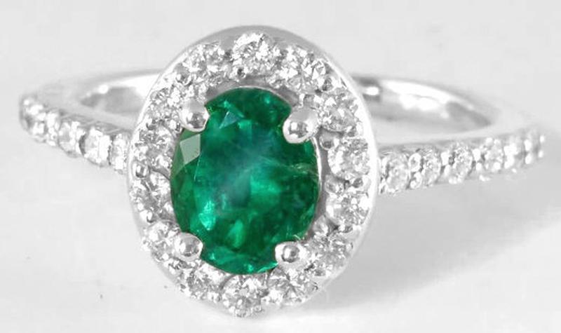 Natural Colombian Emerald Ring with Brilliant Diamond Halo Setting and Diamonds Accenting the band in 14k white gold