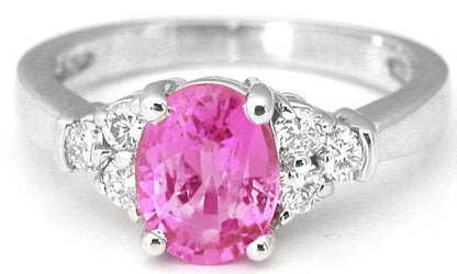 Natural pink sapphire ring in 14k white gold