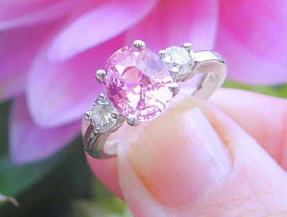 Large Oval Natural Pink Sapphire and Diamond Three Stone Ring in 14k white gold for sale