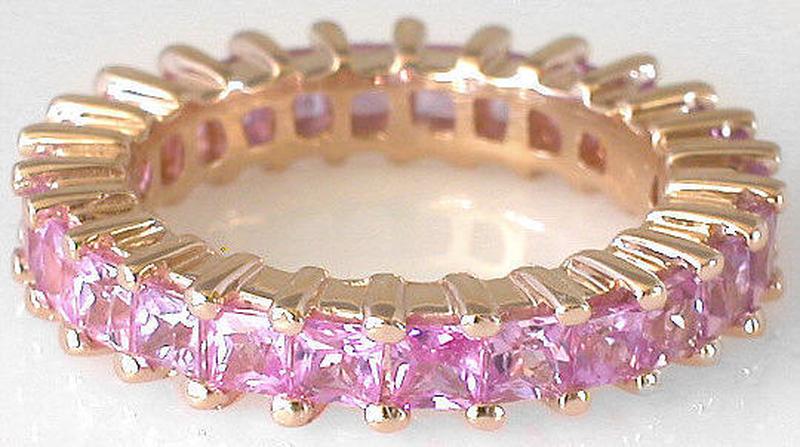 Princess cut natural pink sapphire eternity ring in gold