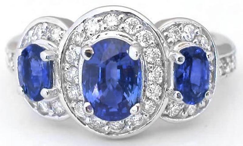 Halo set oval cut natural blue sapphire ring in 14k white gold