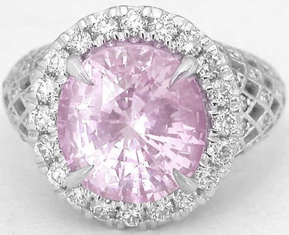Natural Oval Light Pink Sapphire Ring with Diamond Halo in ornate white gold band for sale