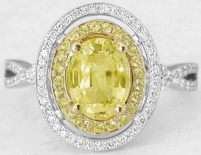 Halo set natural yellow sapphire ring in 14k white and yellow gold