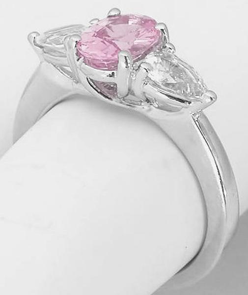 7x5mm Oval Natural Pink Sapphire and Trillion White Sapphire Ring in 14k white gold