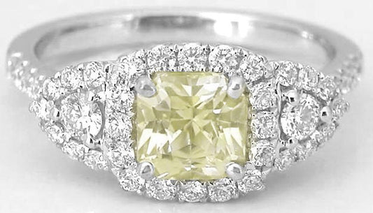 Natural Radiant Yellow Sapphire Three Stone Ring with a Real Diamond Halo in 18k white gold