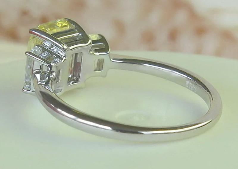 Back view of Radiant Cut Natural Yellow and White Sapphire Three Stone Engagement Ring