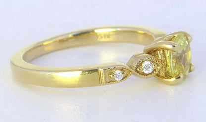 Natural yellow sapphire and diamond ring in 14k yellow gold