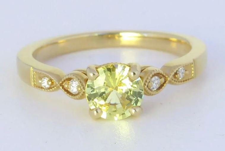 Natural yellow sapphire and diamond ring in 14k yellow gold