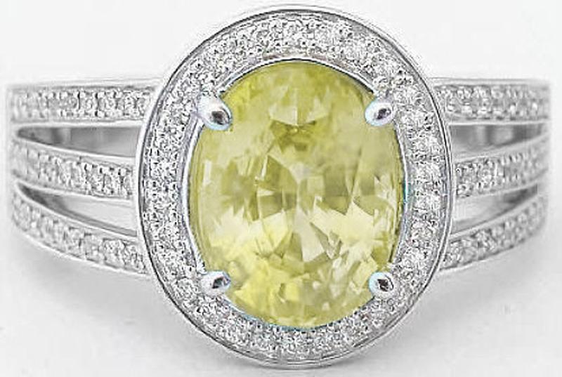 Natural Unheated Oval Yellow Sapphire Ring with Diamond Halo and Split Shank Ring in 14k white gold