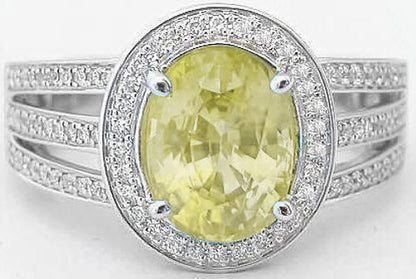 Natural Unheated Oval Yellow Sapphire Ring with Diamond Halo and Split Shank Ring in 14k white gold