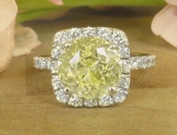 Natural Unheated Round Yellow Sapphire and Diamond Halo Ring in 14k white gold