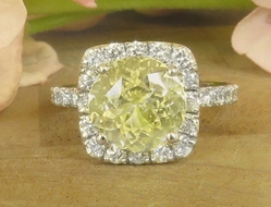 Natural Unheated Round Yellow Sapphire and Diamond Halo Ring in 14k white gold