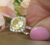 Unheated Round Yellow Sapphire Ring with a Diamond Halo Ring set in 14k white gold