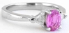 Platinum Natural Oval Pink Sapphire Three Stone Ring with Trillion Side Diamonds