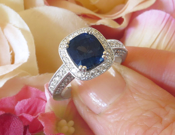 Cushion cut sapphire hot sale and diamond ring